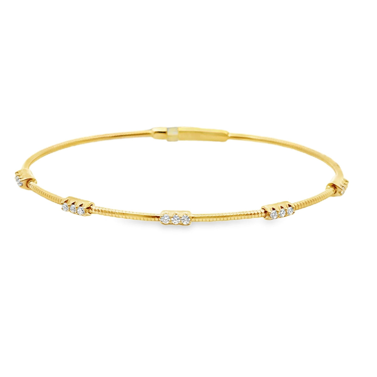 14k yellow gold flexible brace - Kelly Wade Jewelers