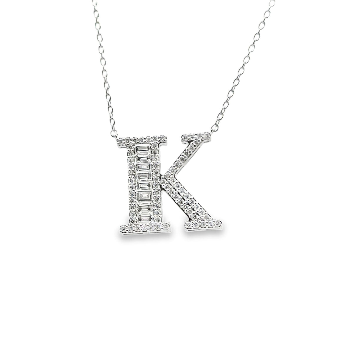 18k white gold baguette and ro - Kelly Wade Jewelers