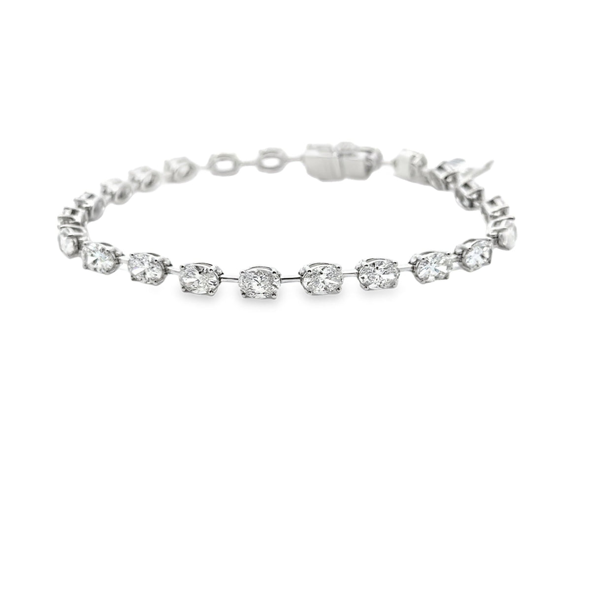 18k white gold oval east to we - Kelly Wade Jewelers