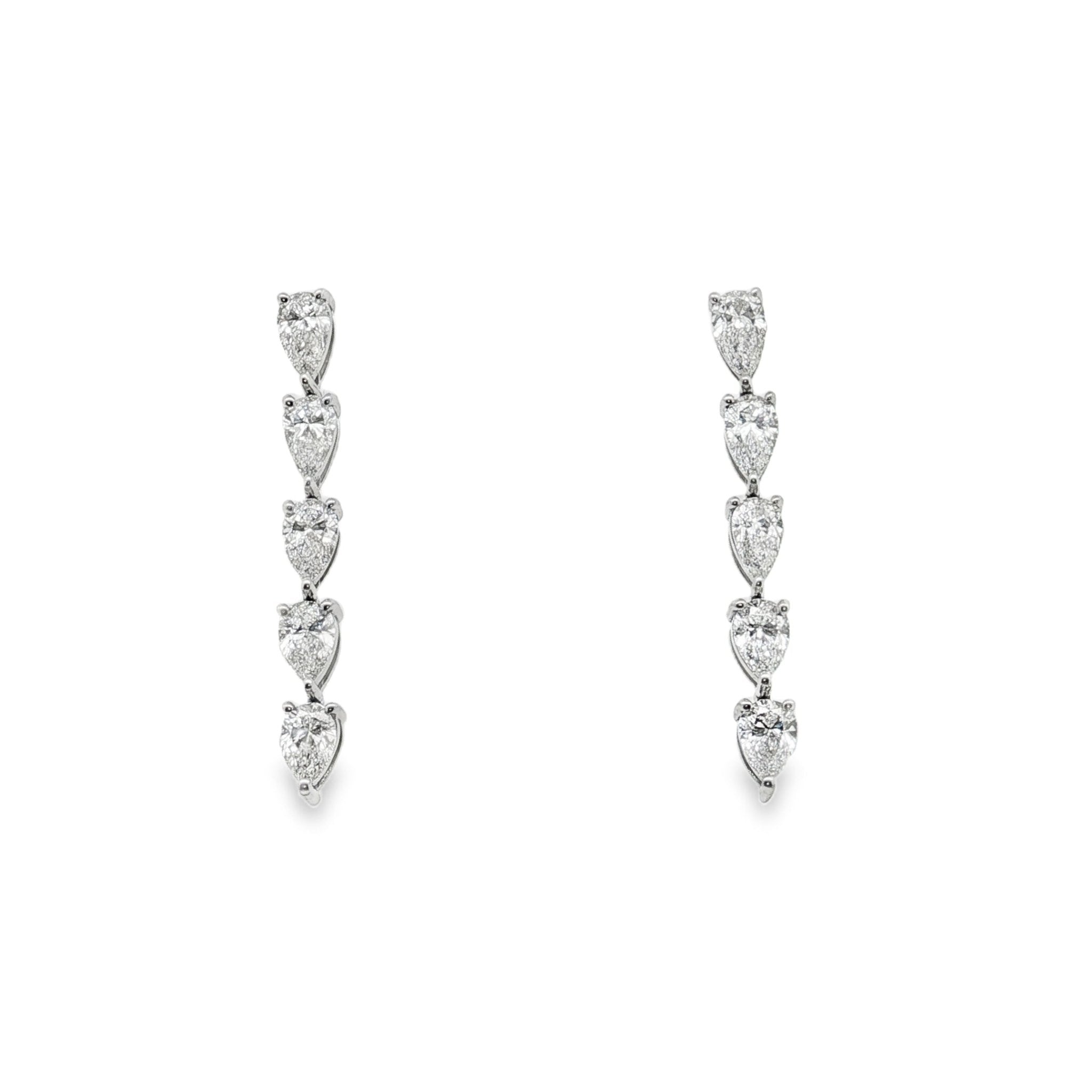 18k white gold pear shaped dia - Kelly Wade Jewelers