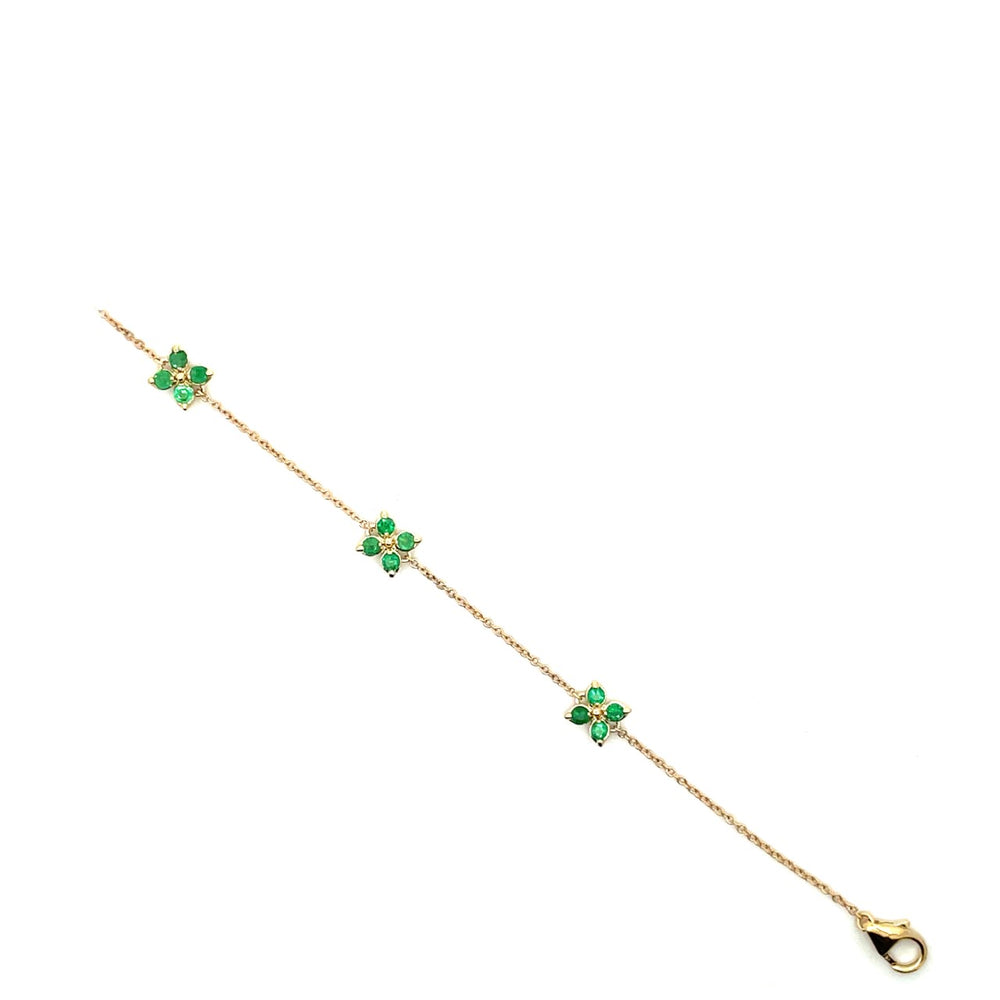 yellow gold and emerald bracelet