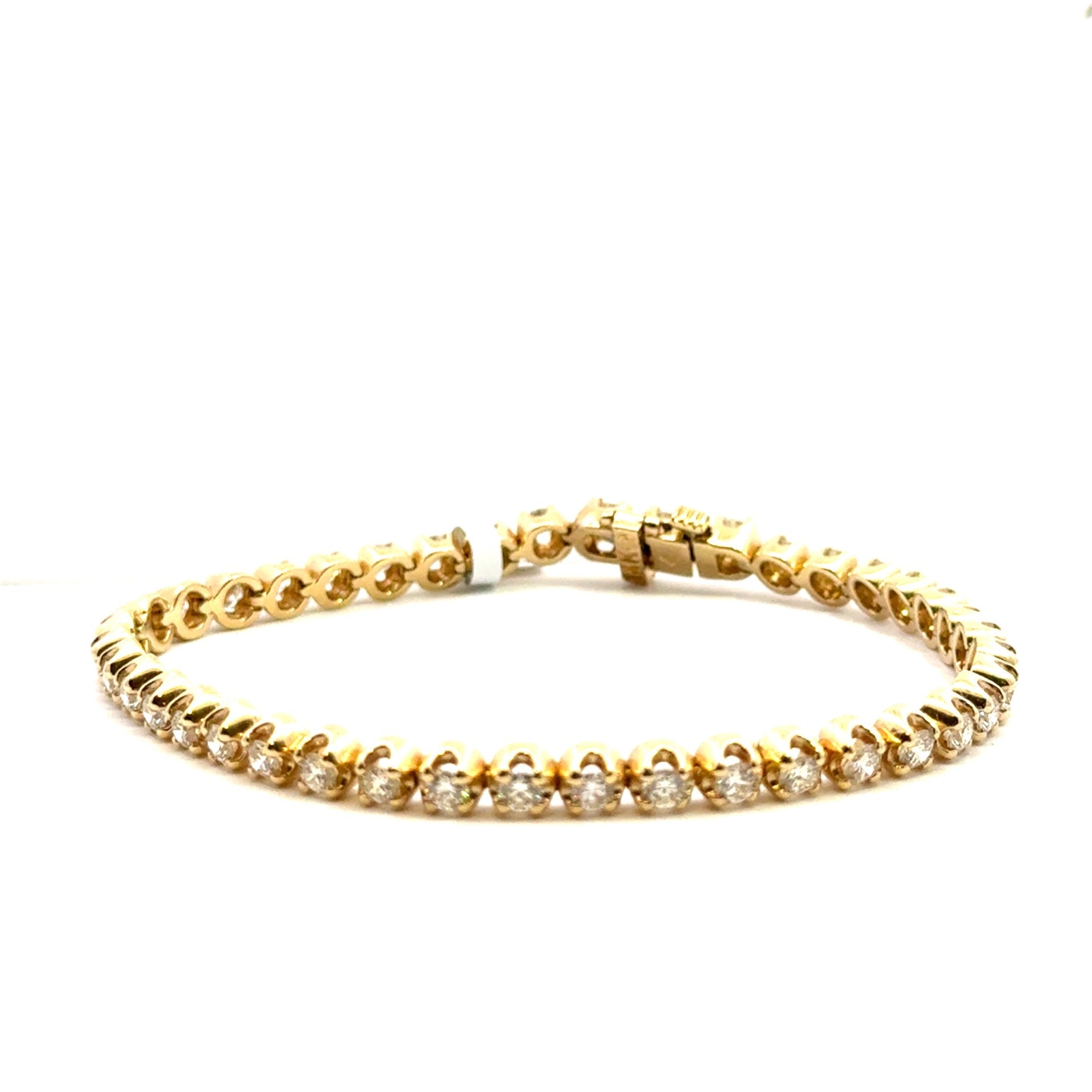 Gold Crown Set Diamond Tennis Bracelet - Kelly Wade Jewelers